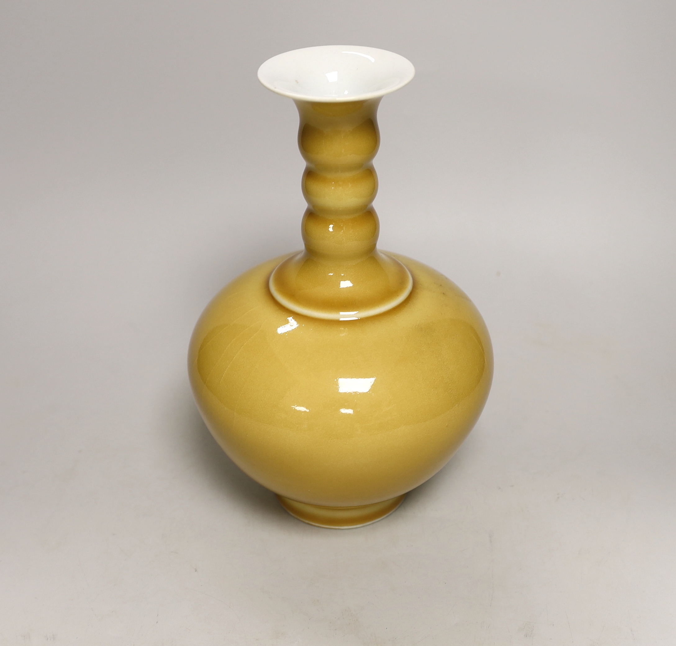 A Chinese yellow ground bottle vase, 25cm high